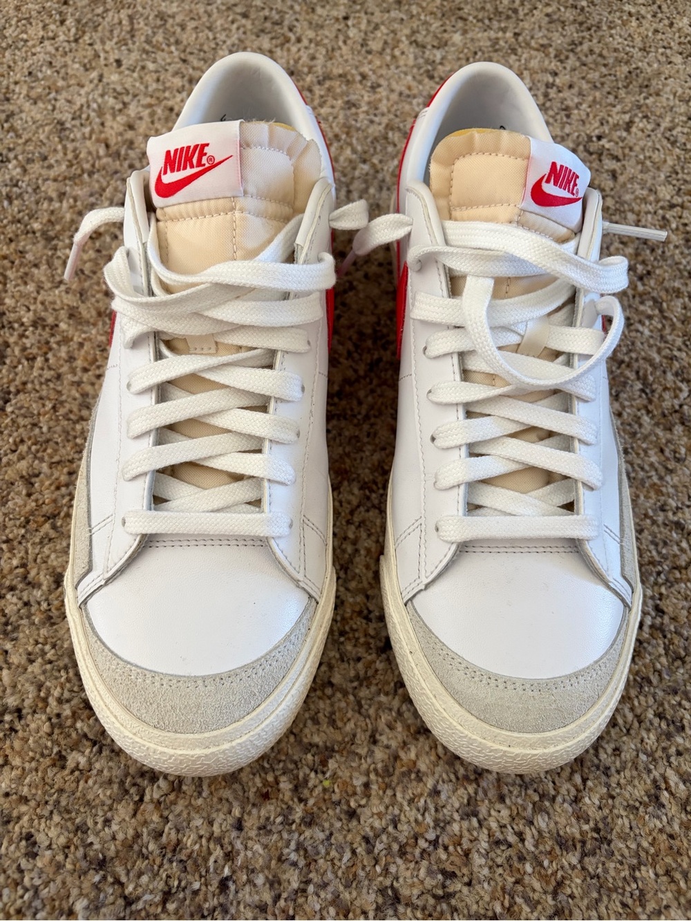 Men’s size 9 Nike White Sneakers with Red Swoosh Accents